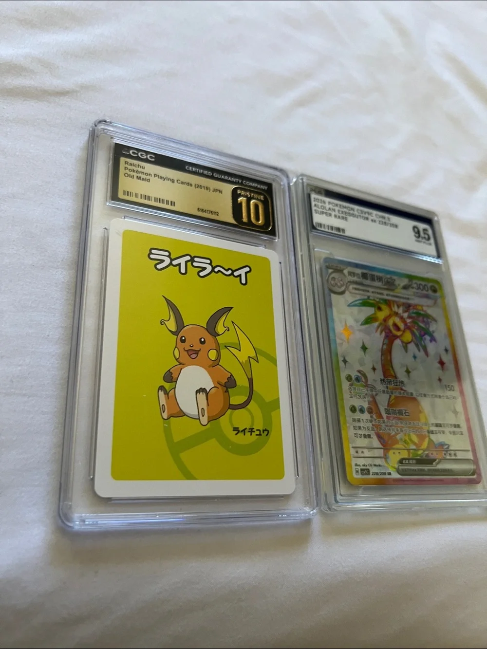 Pokemon Yellow Raichu & Alolan Exeggutor Graded Trading Cards